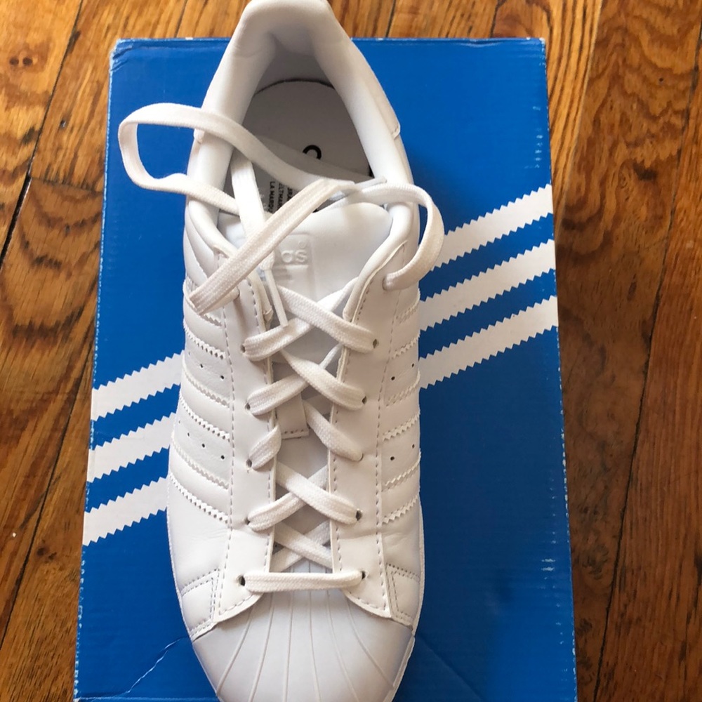 All white adidas shoes